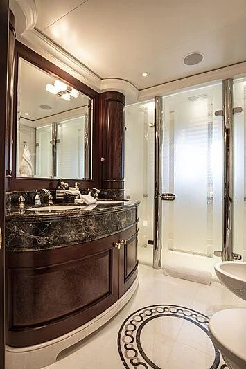 a bathroom with a marble counter top aboard FIREBIRD Yacht for Charter