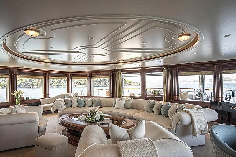 a living room with a large window aboard FIREBIRD Yacht for Charter