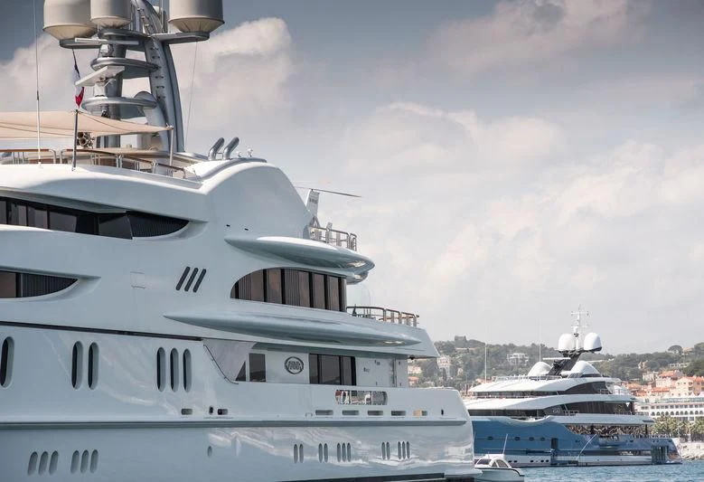 a white yacht in the water aboard FIREBIRD Yacht for Charter