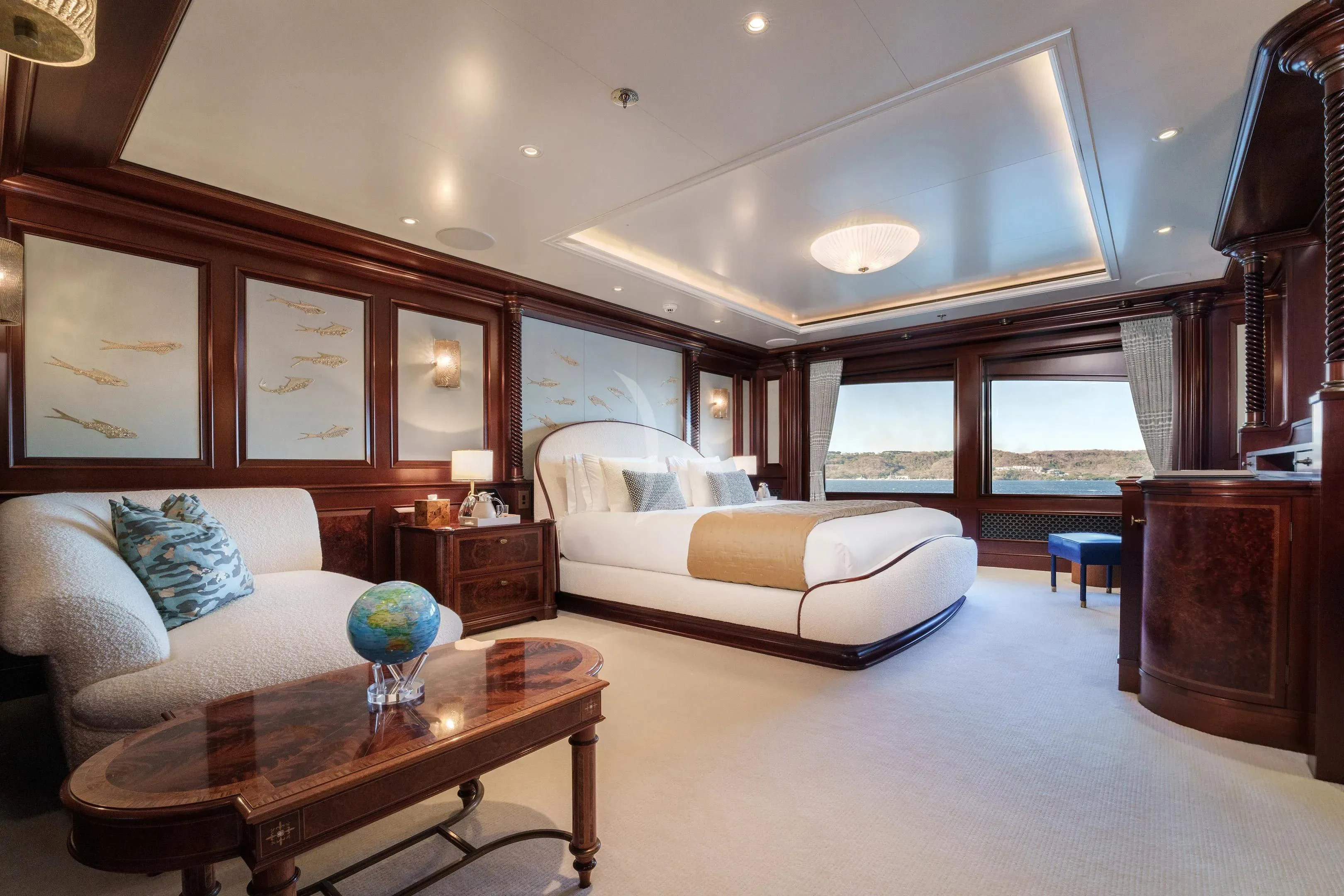 a large bedroom with a large bed aboard FIREBIRD Yacht for Charter