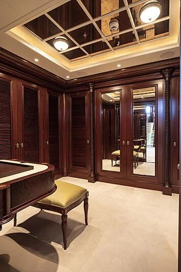 a room with a table and chairs aboard FIREBIRD Yacht for Charter