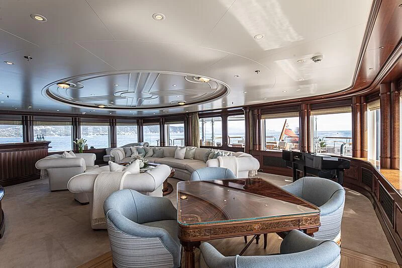 a large living room with a large glass ceiling aboard FIREBIRD Yacht for Charter