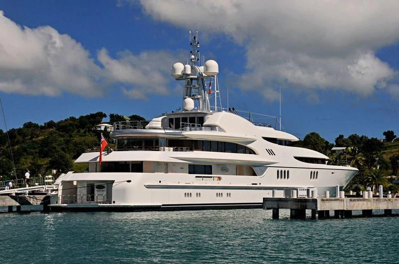 a large white boat in the water aboard FIREBIRD Yacht for Charter