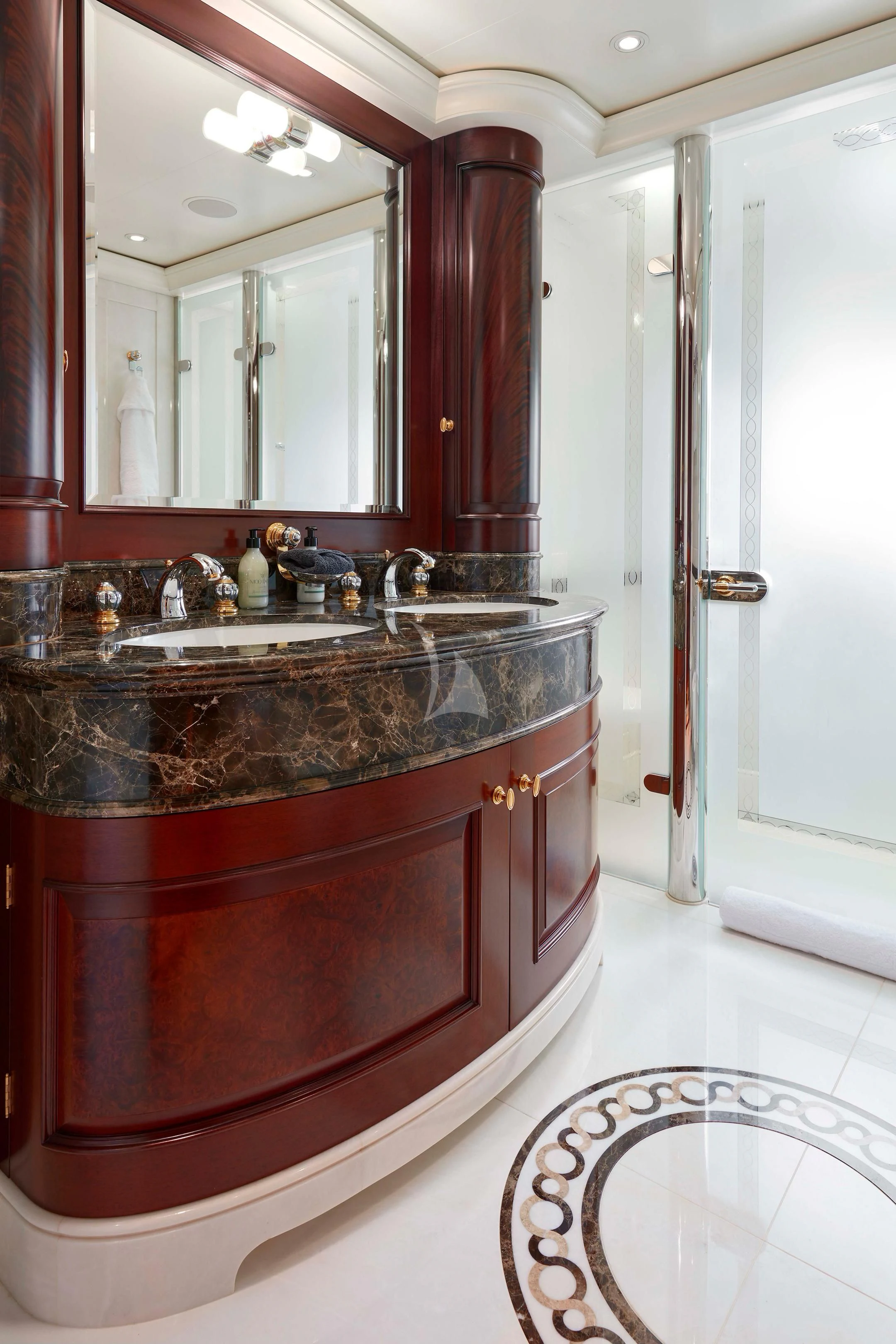 a bathroom with a marble counter top aboard FIREBIRD Yacht for Charter