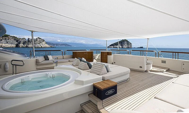 a room with a pool and a view of the ocean aboard FIREBIRD Yacht for Charter