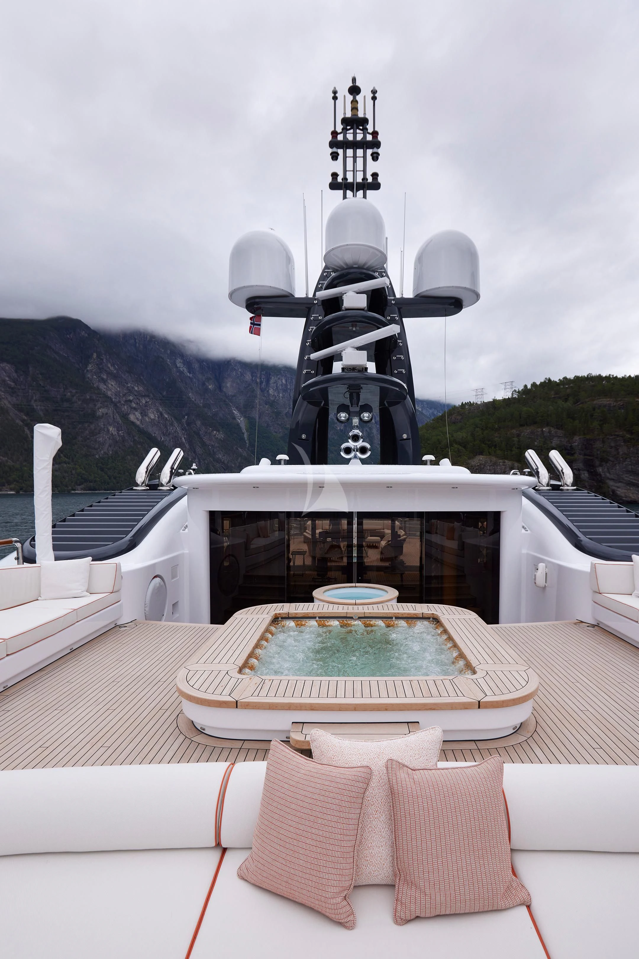 a boat with a large statue on it aboard FIREBIRD Yacht for Charter