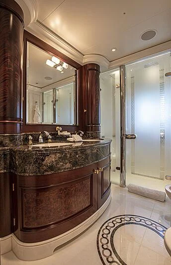 a bathroom with a marble counter top aboard FIREBIRD Yacht for Charter