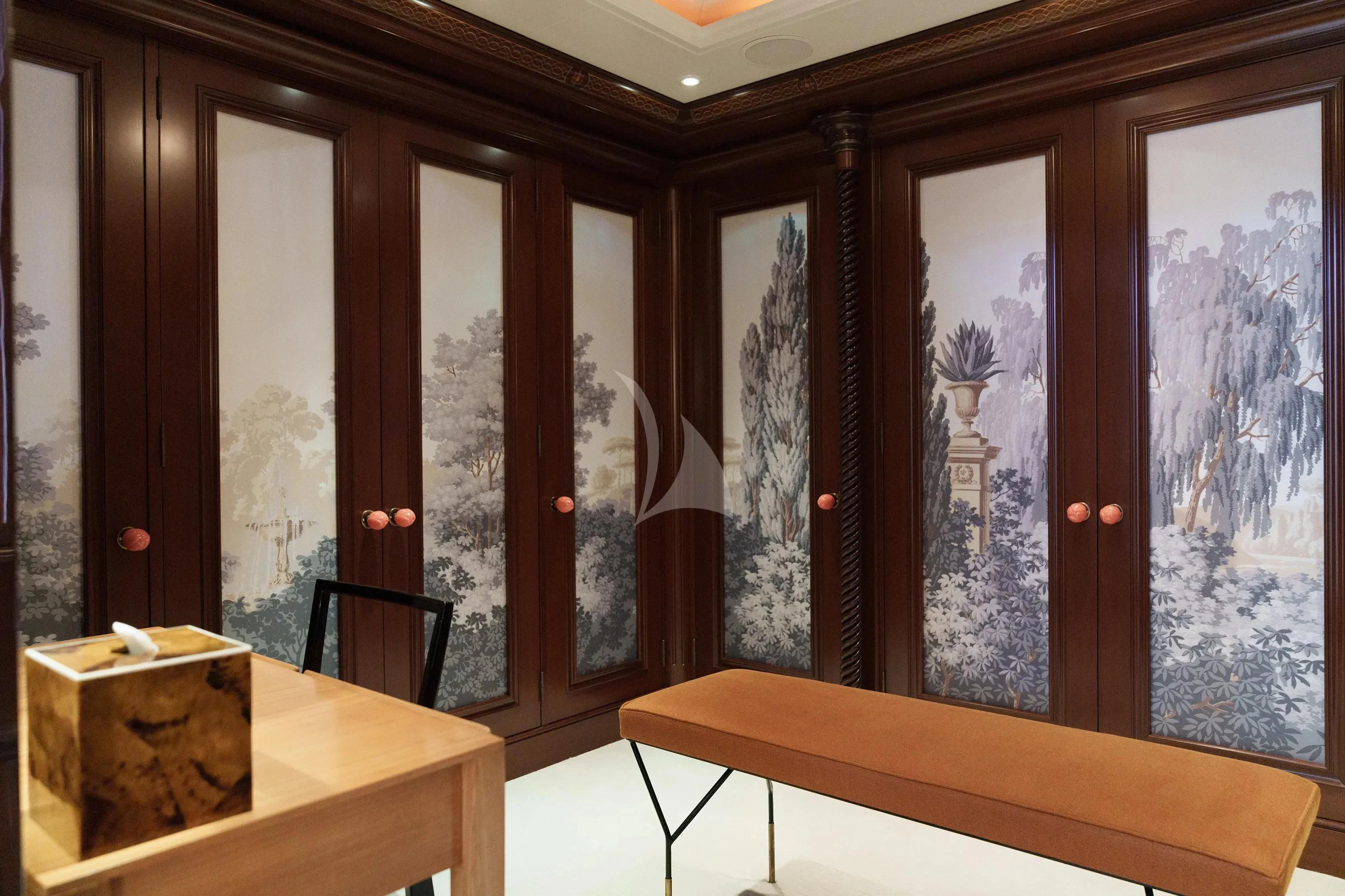 a room with a table and a window aboard FIREBIRD Yacht for Charter