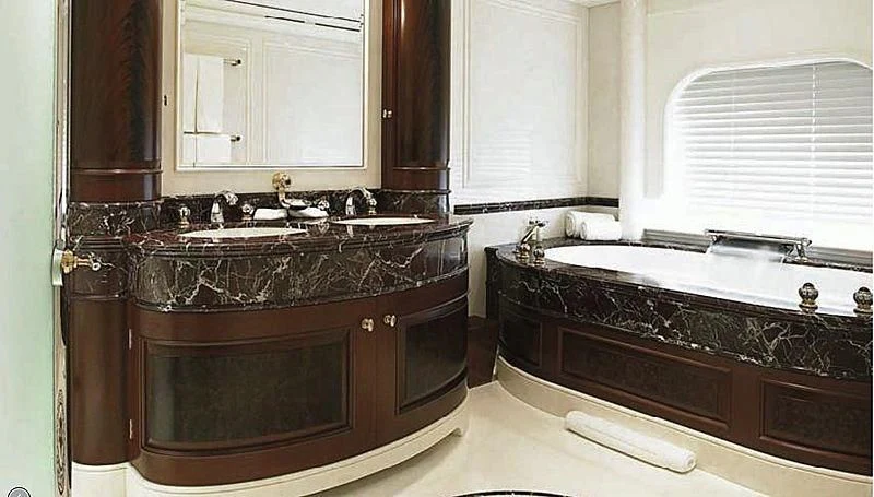 a kitchen with a marble counter top aboard FIREBIRD Yacht for Charter