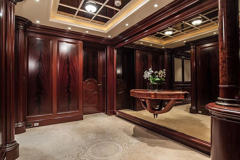 a room with a table and chairs aboard FIREBIRD Yacht for Charter