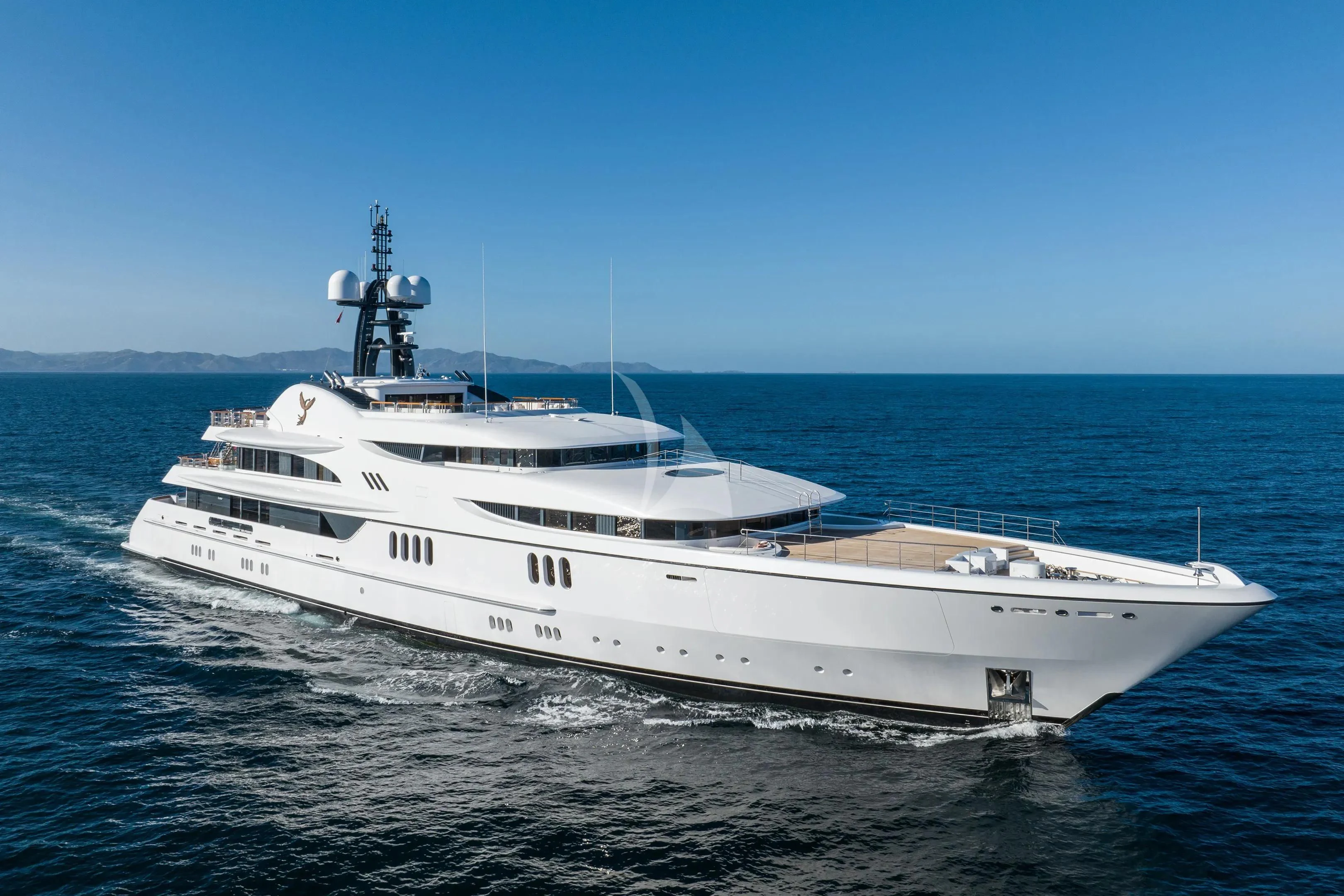 a large white ship in the water aboard FIREBIRD Yacht for Charter