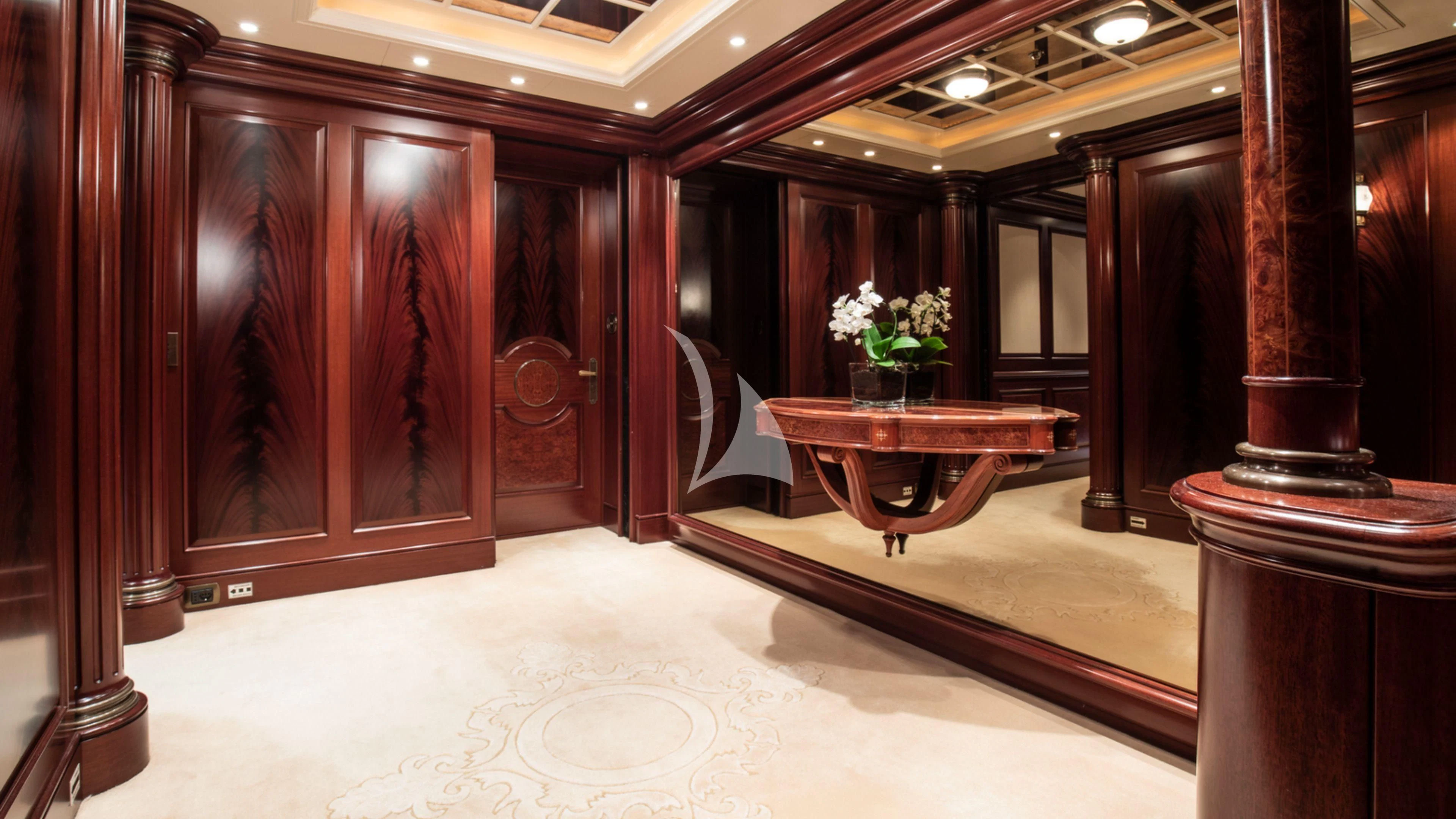 a room with a table and chairs aboard FIREBIRD Yacht for Charter