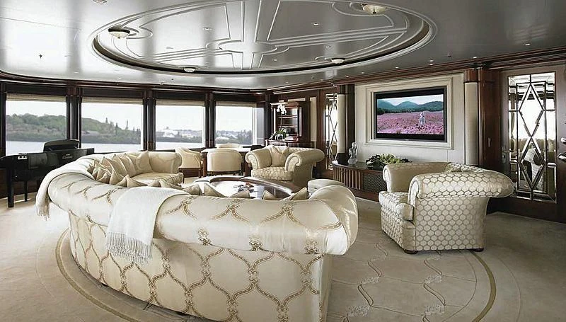 a living room with a large window aboard FIREBIRD Yacht for Charter
