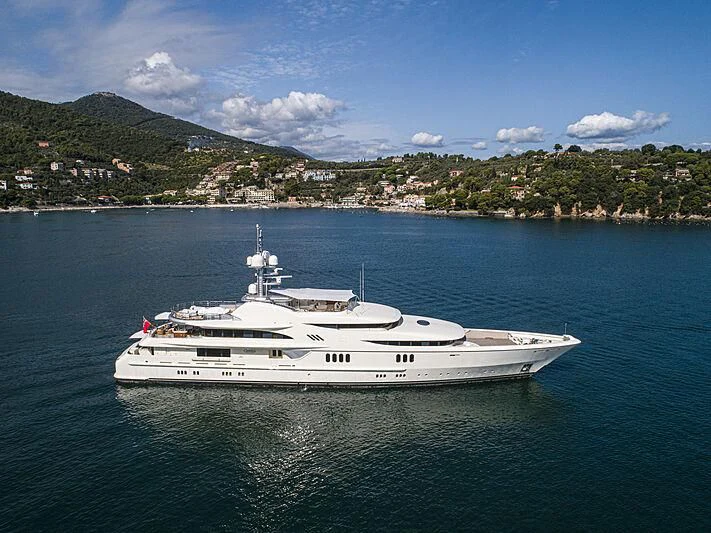 a white boat in the water aboard FIREBIRD Yacht for Charter