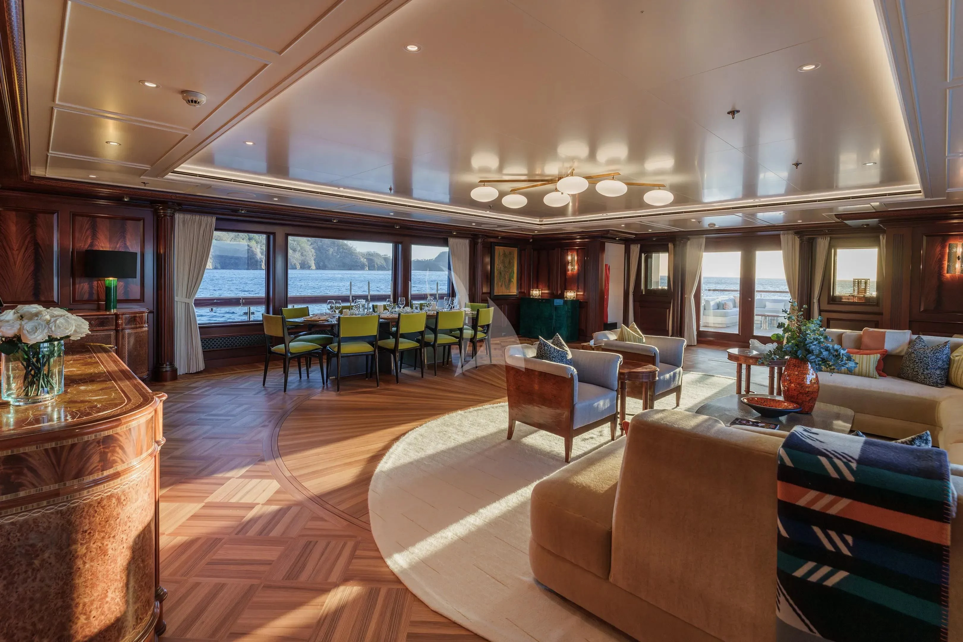 a large living room with a large open floor plan aboard FIREBIRD Yacht for Charter