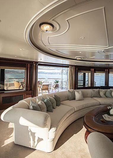 a living room with a couch aboard FIREBIRD Yacht for Charter