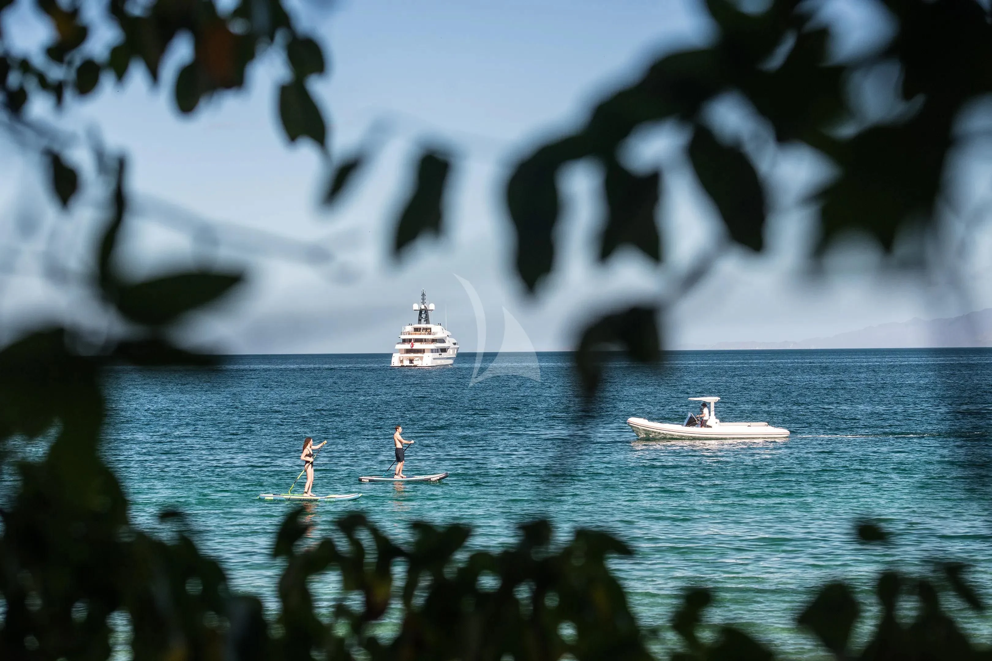a group of people in a boat in the water aboard FIREBIRD Yacht for Charter