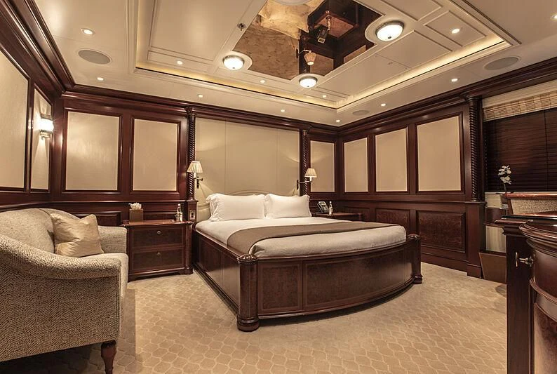 a large bedroom with a large bed aboard FIREBIRD Yacht for Charter
