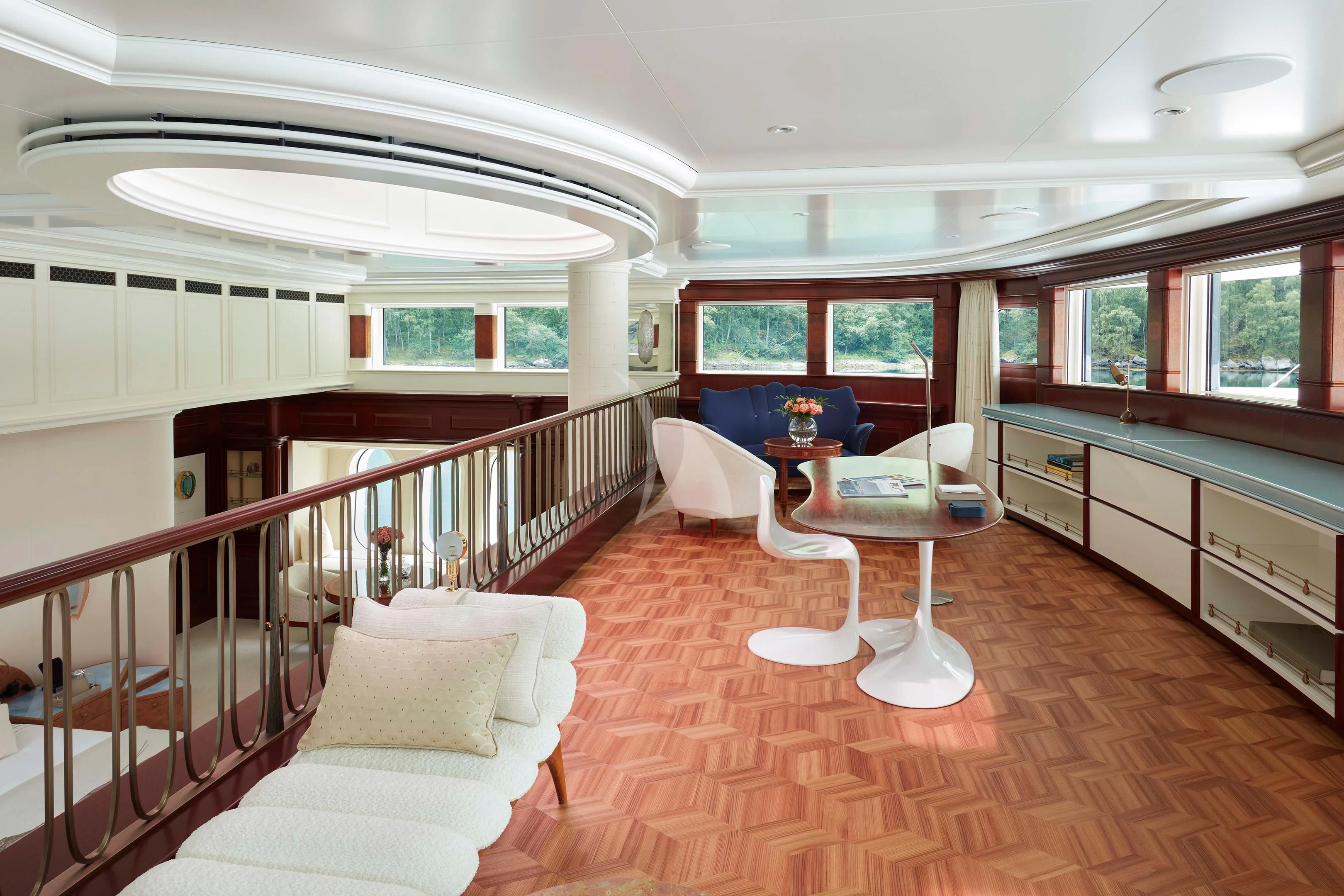 a large open space with a balcony aboard FIREBIRD Yacht for Charter