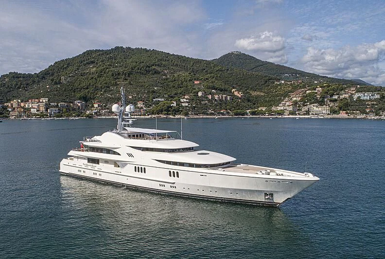 a white boat on the water aboard FIREBIRD Yacht for Charter