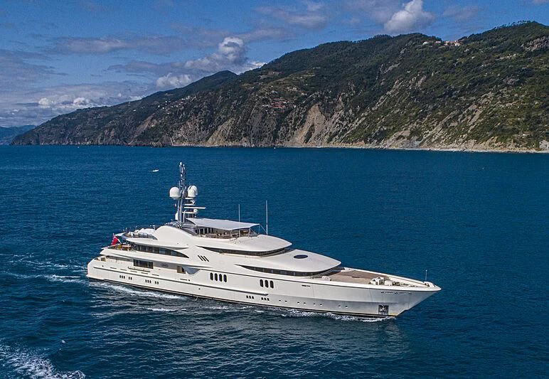 a white yacht in the water aboard FIREBIRD Yacht for Charter