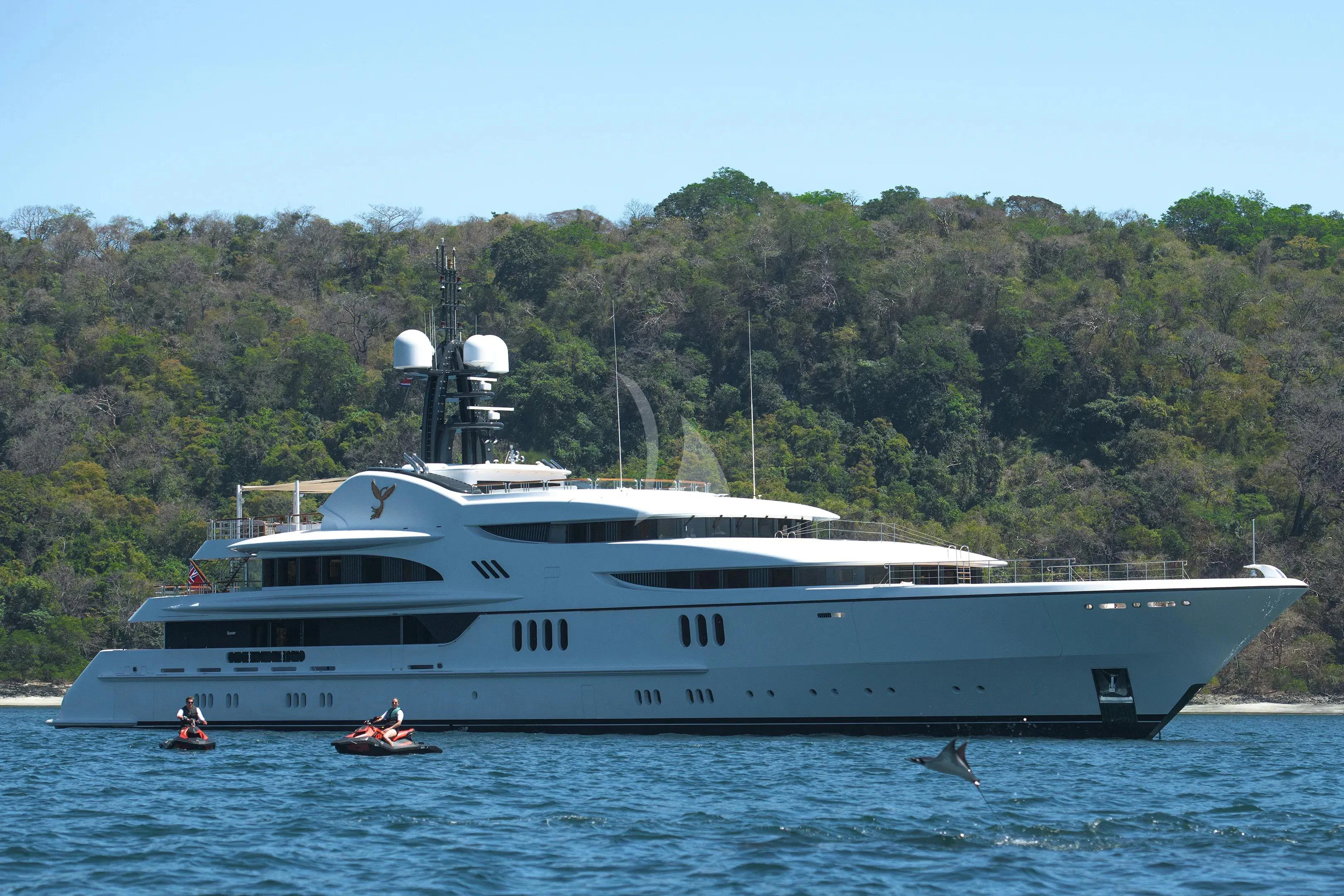 a large white yacht in the water aboard FIREBIRD Yacht for Charter