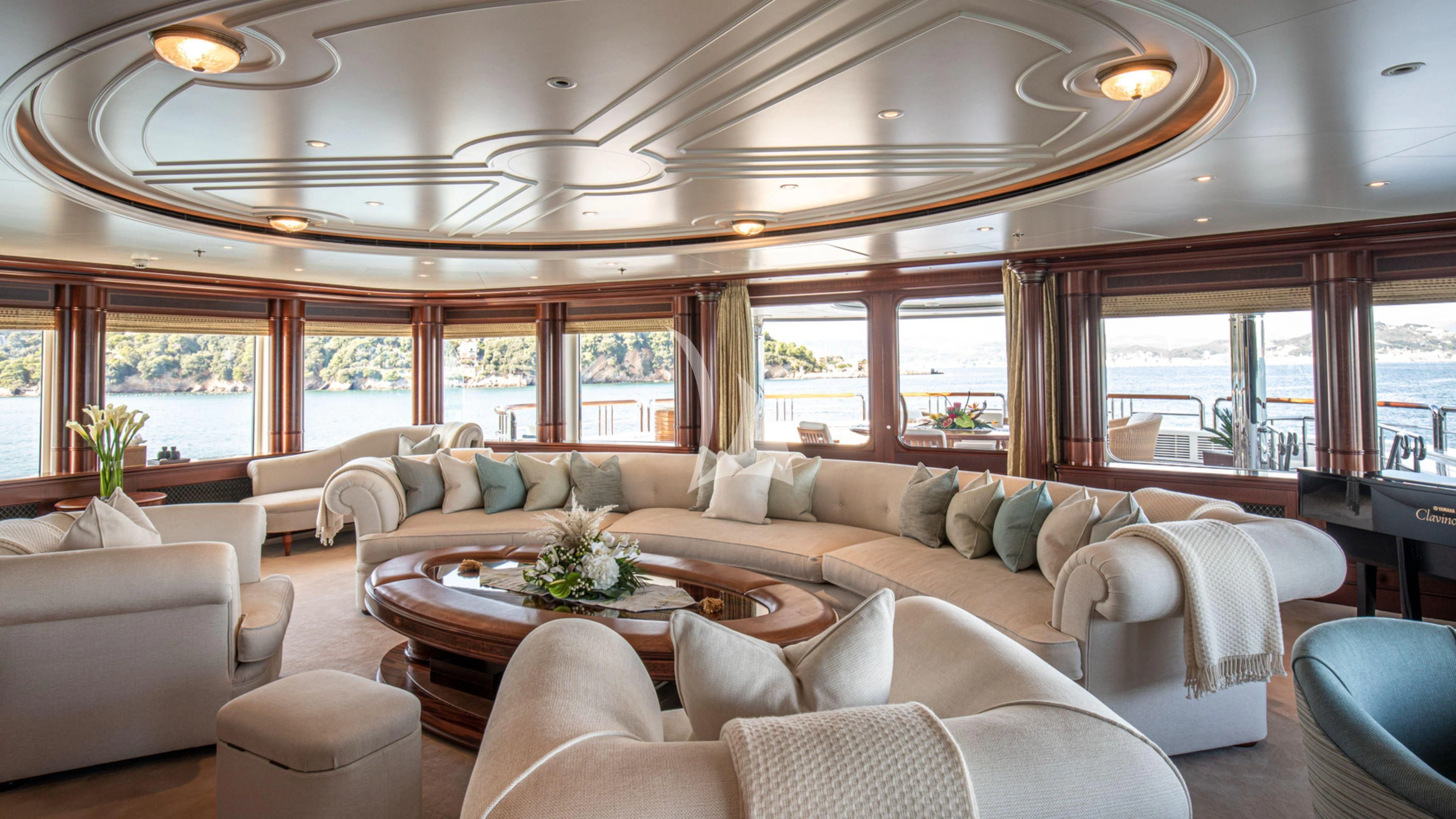 a living room with a large window aboard FIREBIRD Yacht for Charter