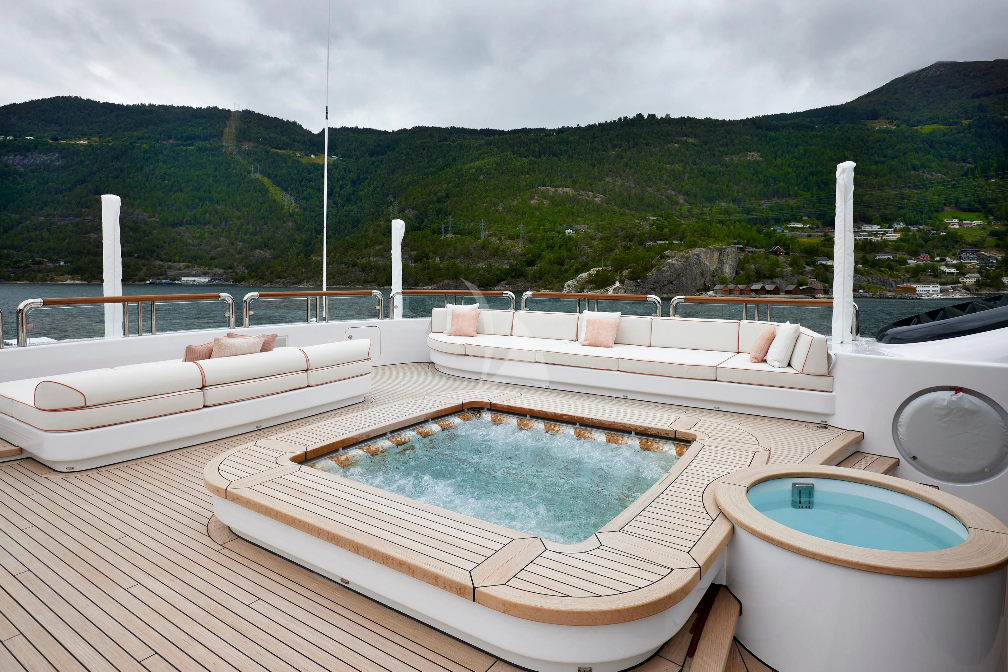 a swimming pool on a deck aboard FIREBIRD Yacht for Charter