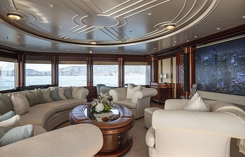a living room with a large window aboard FIREBIRD Yacht for Charter