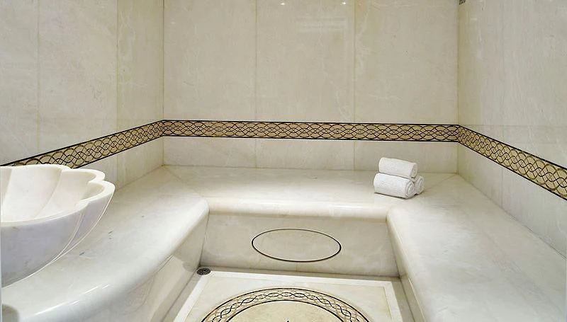 a bathroom with a sink and a bathtub aboard FIREBIRD Yacht for Charter