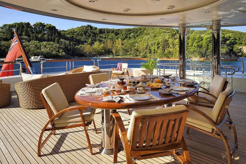 a table set for a meal aboard FIREBIRD Yacht for Charter