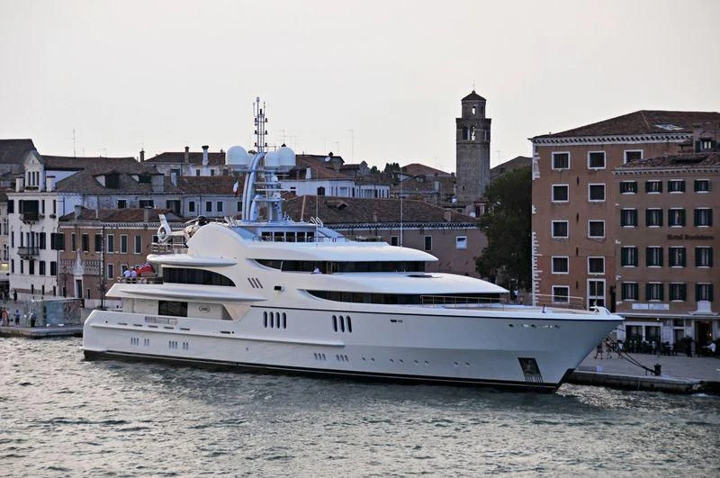 a large white boat in the water aboard FIREBIRD Yacht for Charter