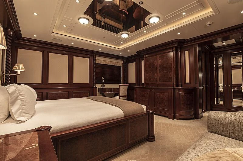 a large bedroom with a large bed aboard FIREBIRD Yacht for Charter