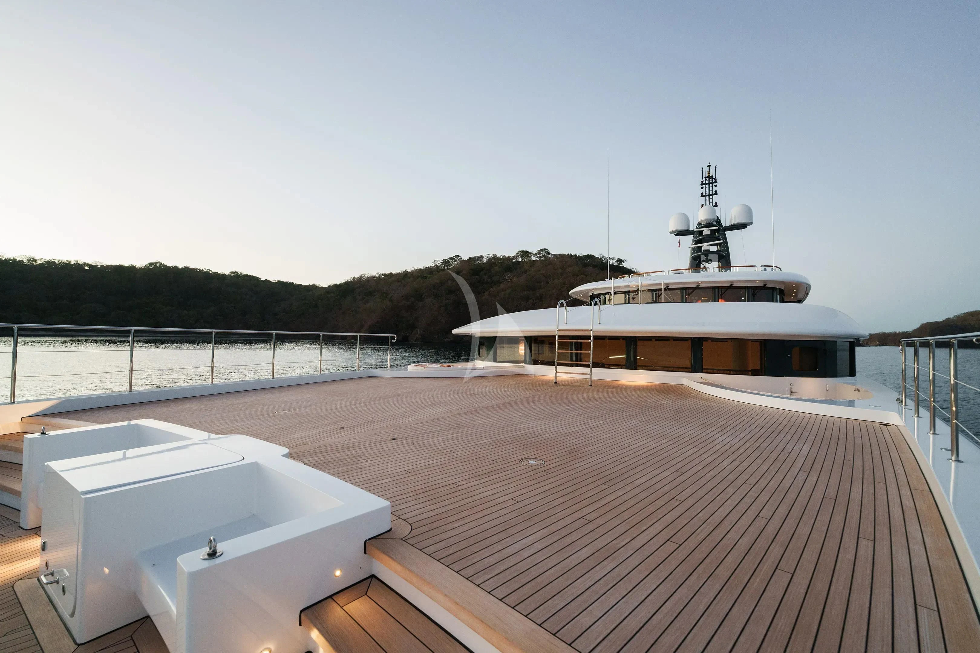 a large ship docked aboard FIREBIRD Yacht for Charter
