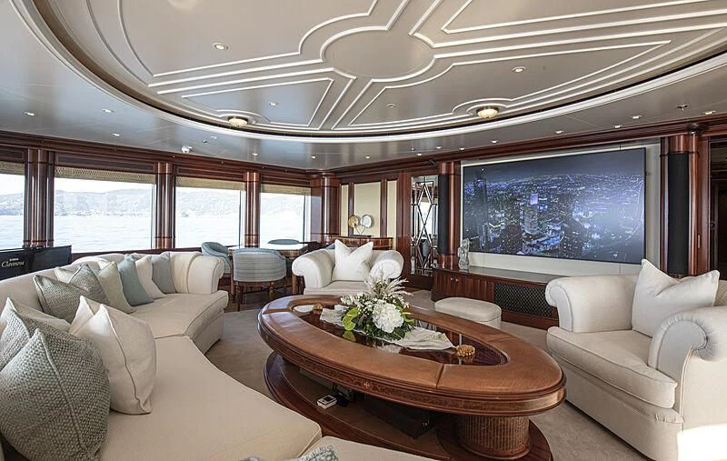 a living room with a large window aboard FIREBIRD Yacht for Charter