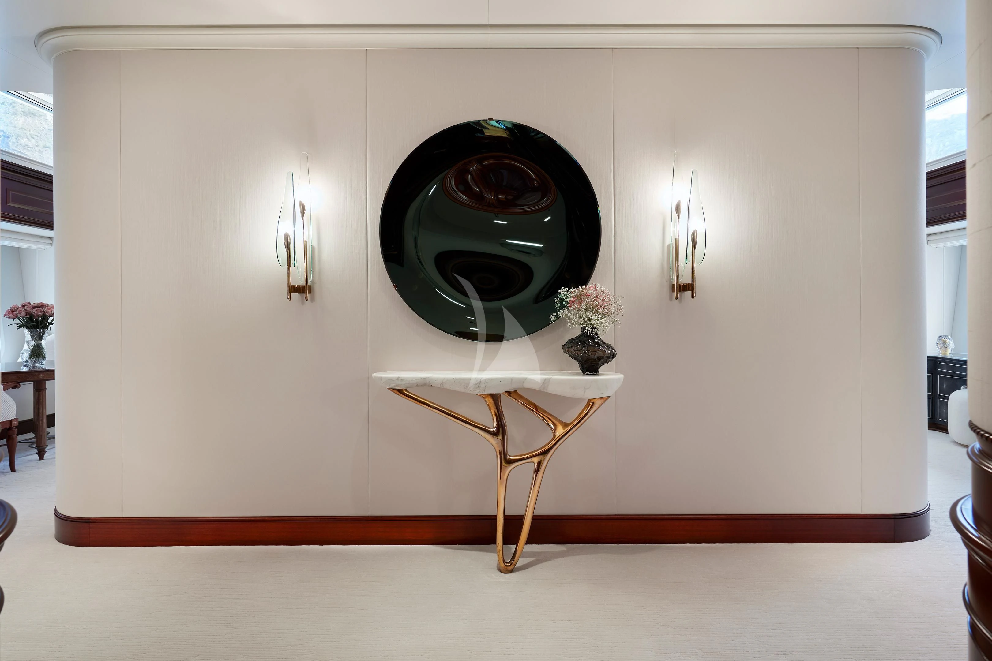 a white room with a fireplace aboard FIREBIRD Yacht for Charter