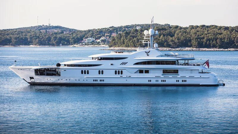 a large white boat in the water aboard FIREBIRD Yacht for Charter