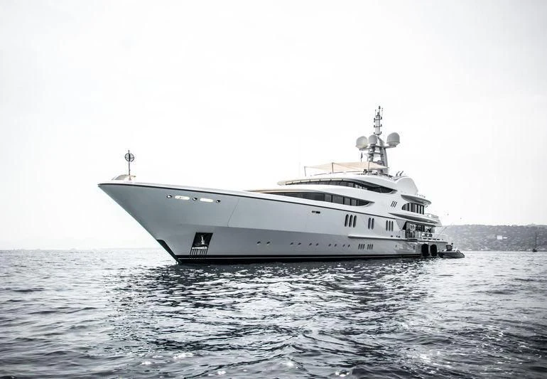 a white boat on the water aboard FIREBIRD Yacht for Charter
