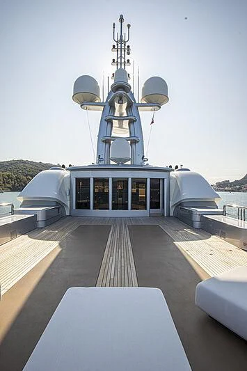 a large white and blue ship aboard FIREBIRD Yacht for Charter
