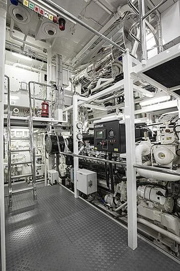 a large white machine aboard FIREBIRD Yacht for Charter