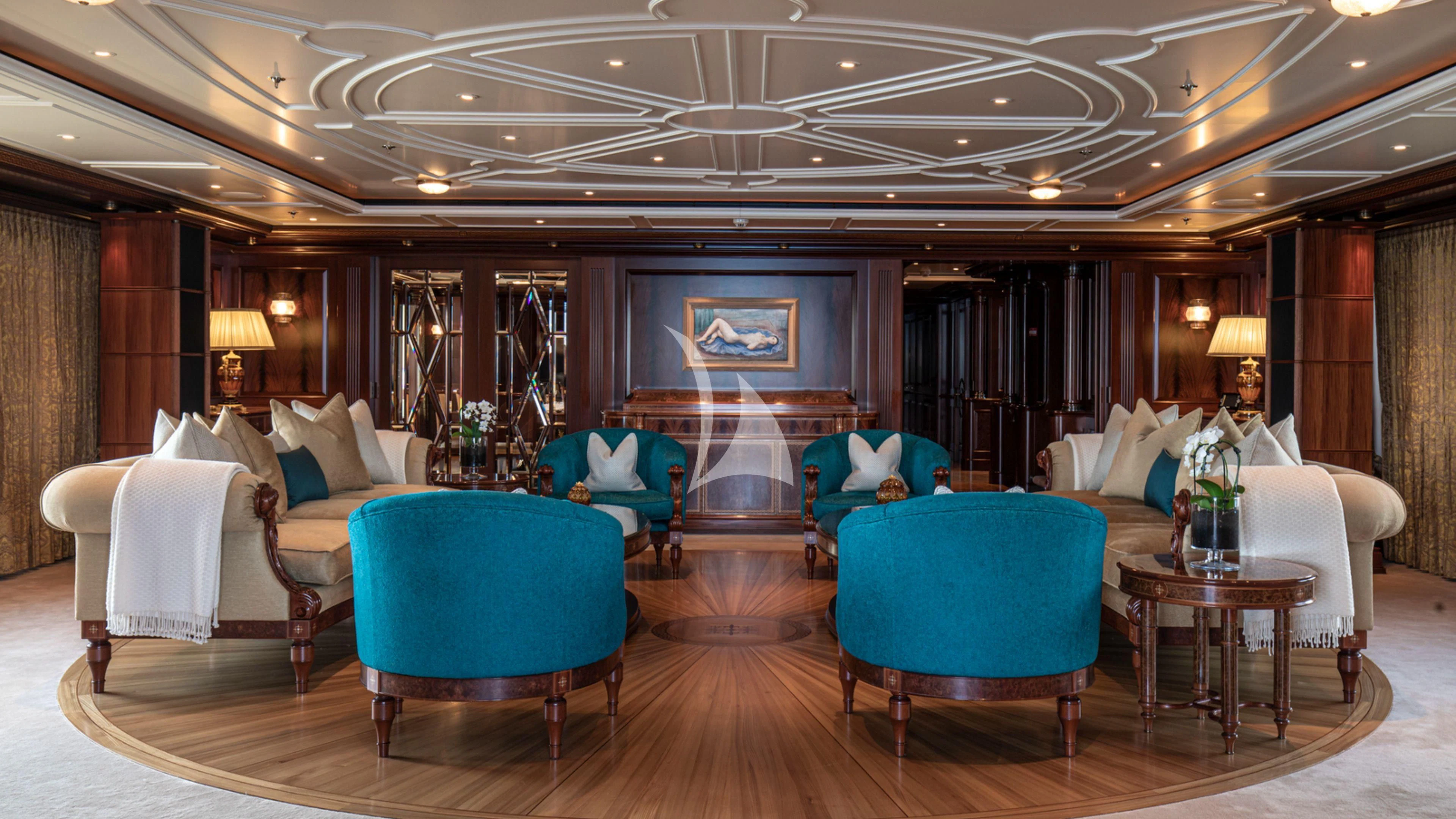 a room with a large table and chairs aboard FIREBIRD Yacht for Charter