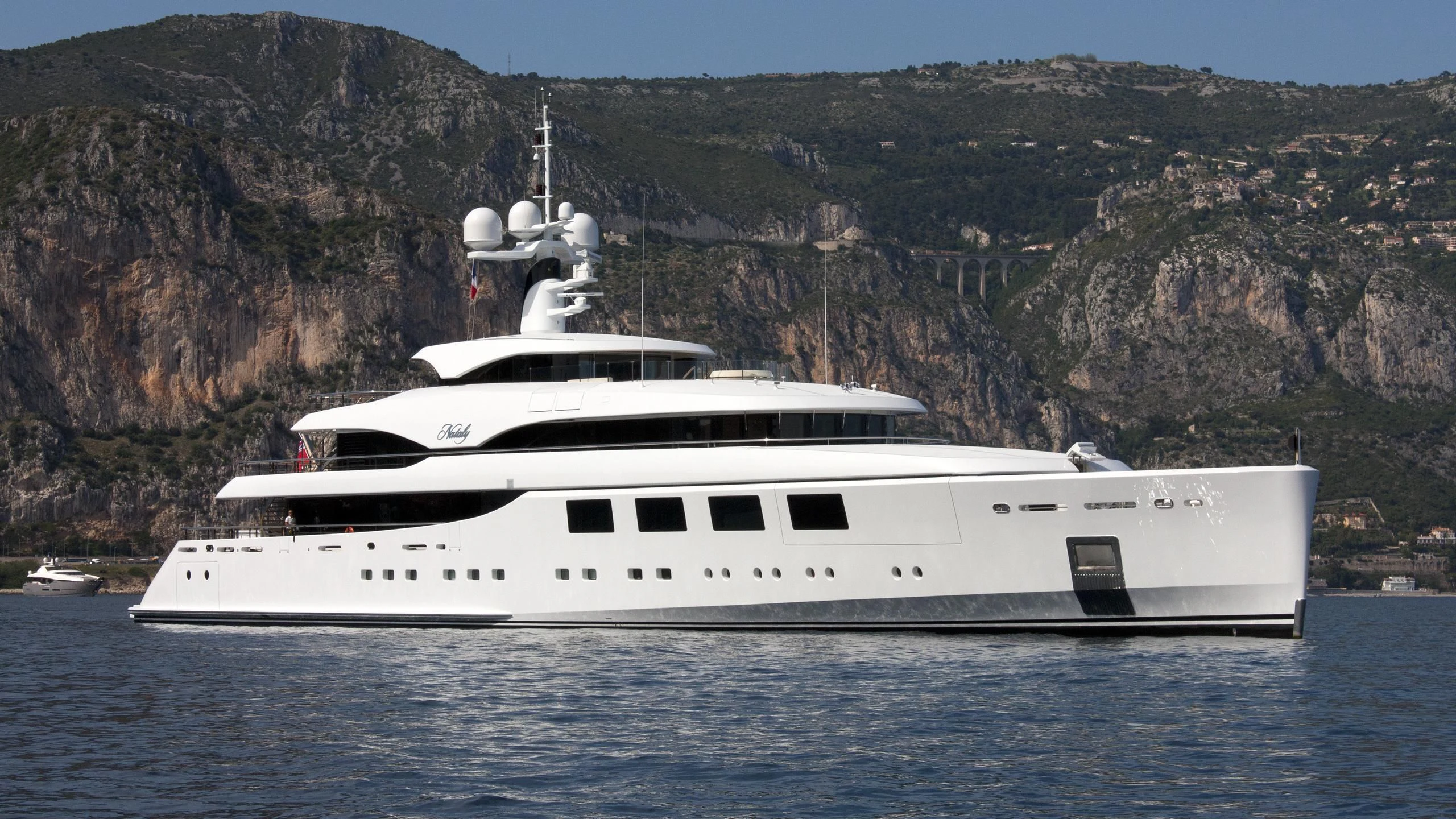a white yacht in the water aboard RAHIL Yacht for Sale