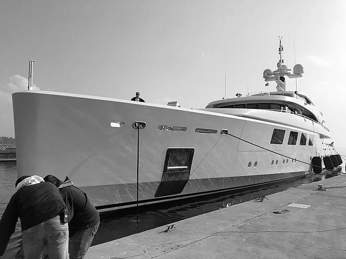 a large ship docked aboard RAHIL Yacht for Sale