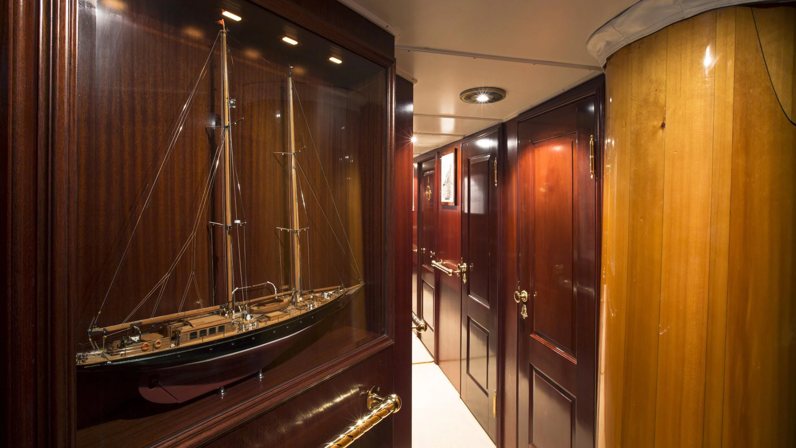 a large mirror in a room aboard ASCHANTI IV OF VEGESACK Yacht for Sale