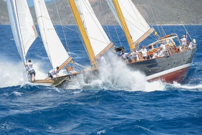 a group of people sailing on a boat aboard ASCHANTI IV OF VEGESACK Yacht for Sale