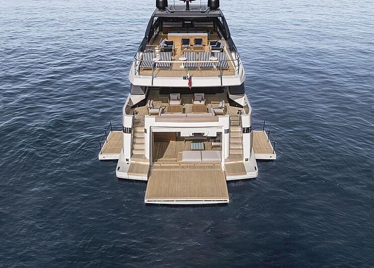 a large ship in the water aboard EROS Yacht for Sale