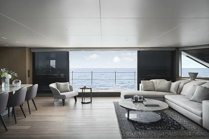 a living room with a large ocean aboard EROS Yacht for Sale