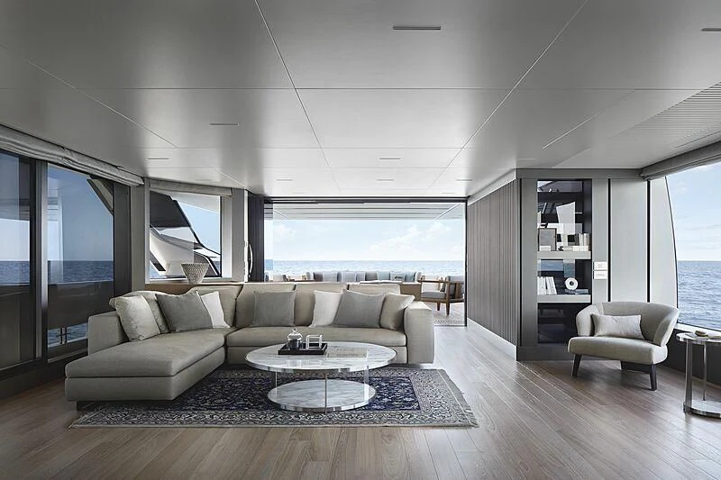 a living room with a large window aboard EROS Yacht for Sale