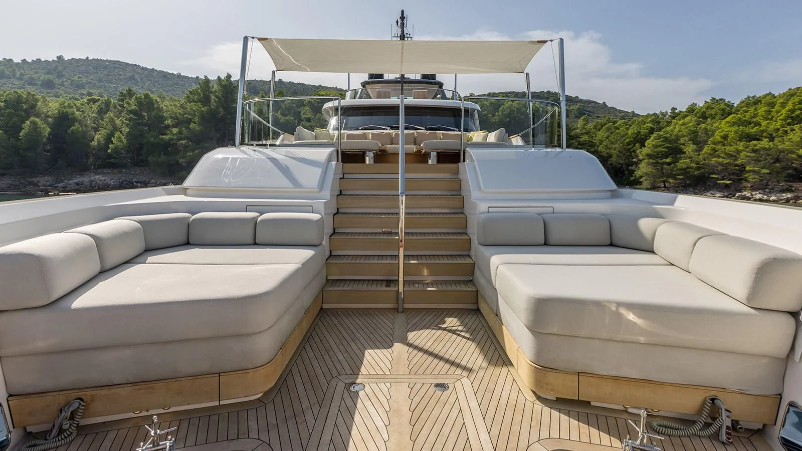 a deck with a deck and a boat on it aboard EROS Yacht for Sale