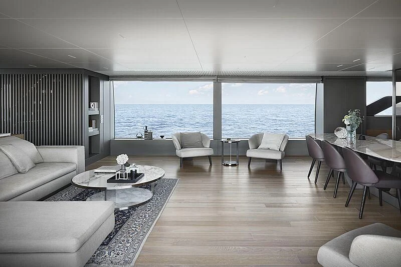 a living room with a large window aboard EROS Yacht for Sale